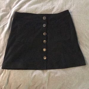 Black faux suede a-line skirt with buttons